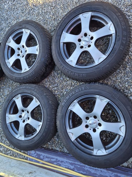 Vând jante+cauciucuri de Wv Tiguan 215/65/17 M+S 5/112/17