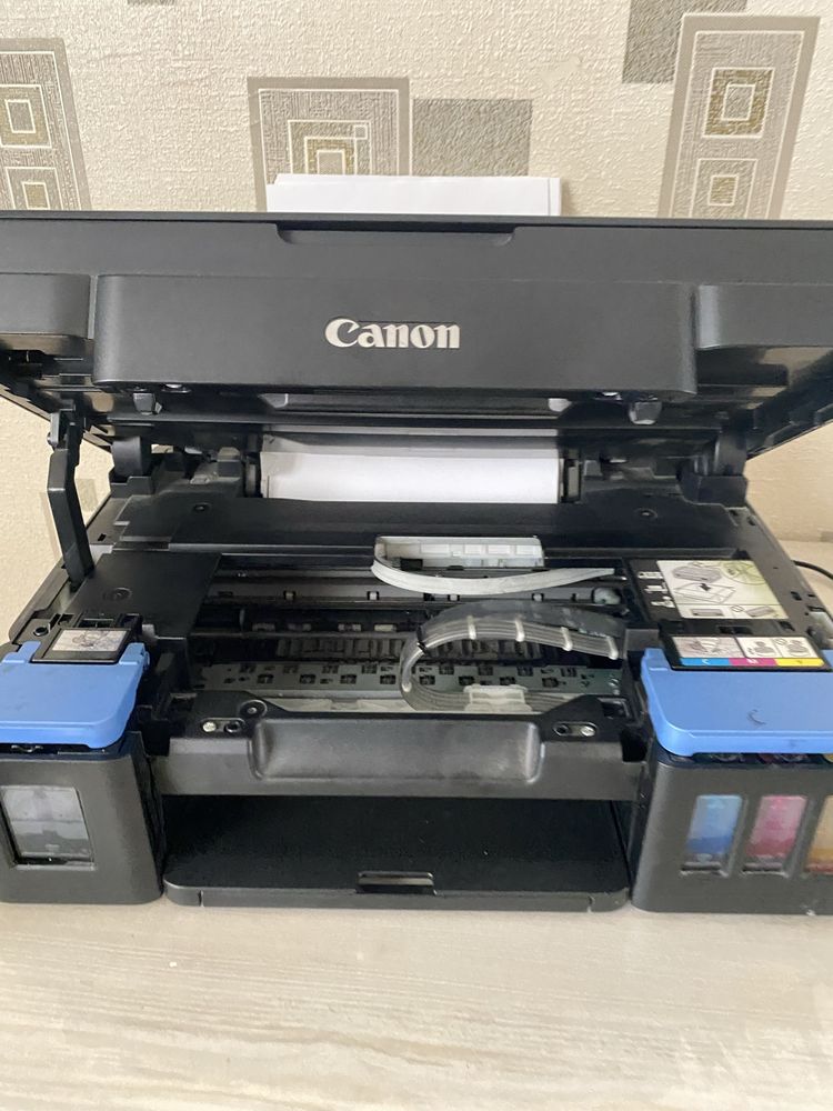 Продается Canon g2411