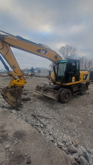 Колёсный экскаватор в аренду