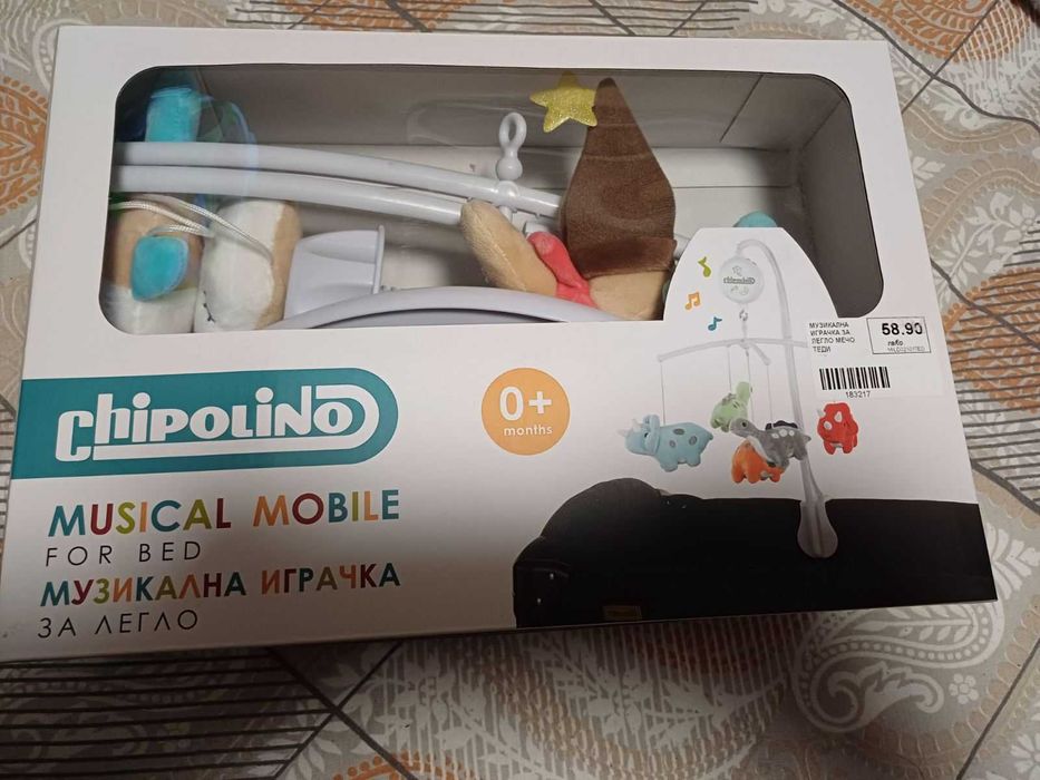 Музикална въртележка за легло и кошара CHIPOLINO  ДИНОЗАВЪРЧЕТА