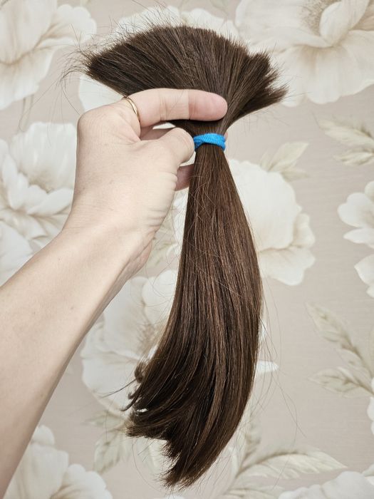 Натуральные,некрашенные,детские волосы-25 см.Густые