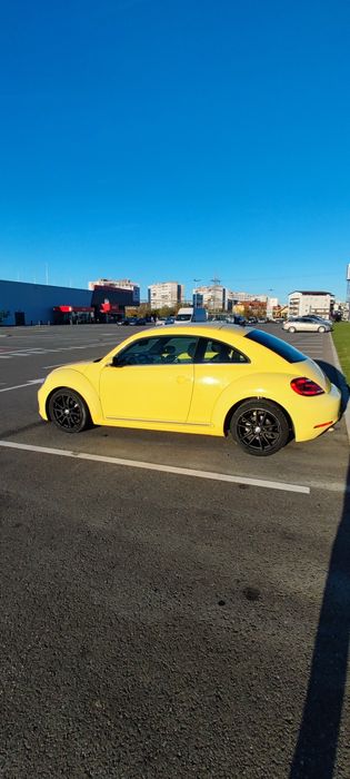 VW BEETLE 1.2 BENZINA 105 CP
2 geamuri electrice
dublu climatronic
sen