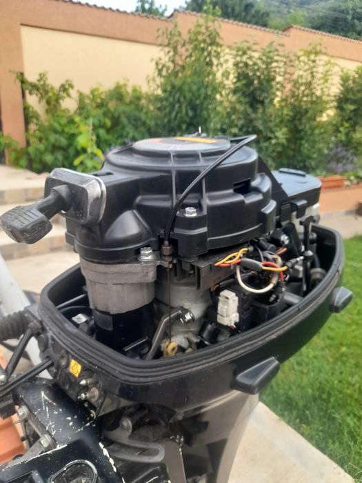 Vând motor barca suzuki