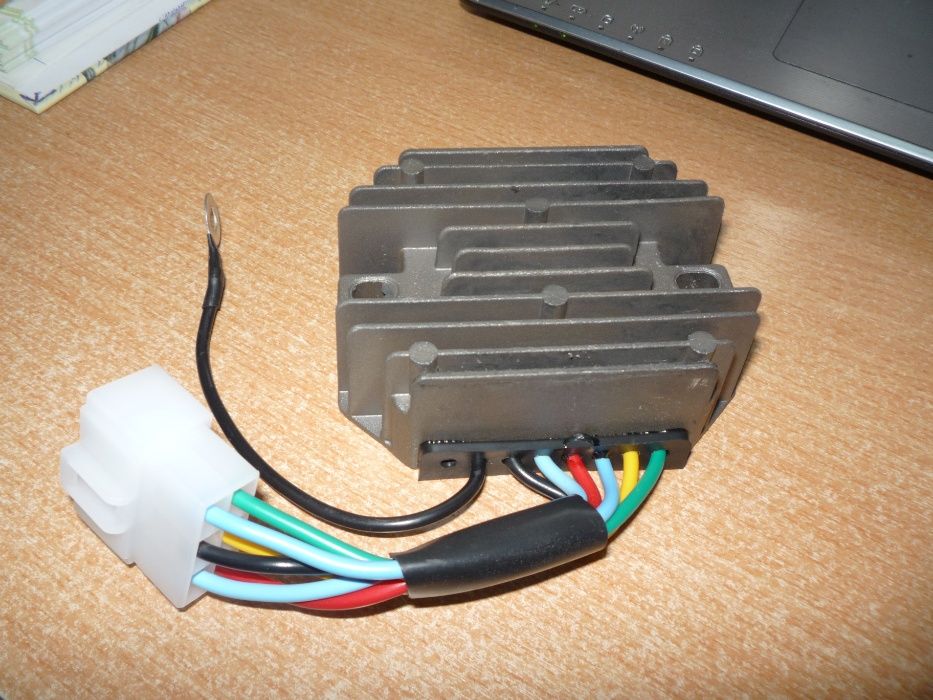 Regulator tensiune KUBOTA,YANMAR 6+1pini