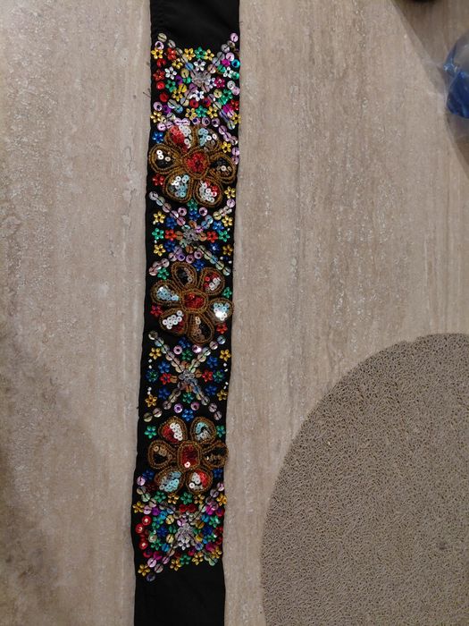 Brâu tradițional cusut manual