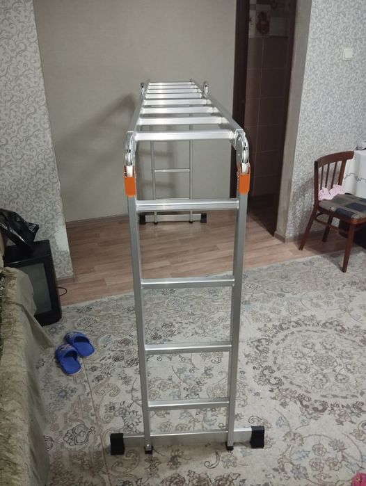 Продам новую лестницу раскладную стремянку  4,5 метровую