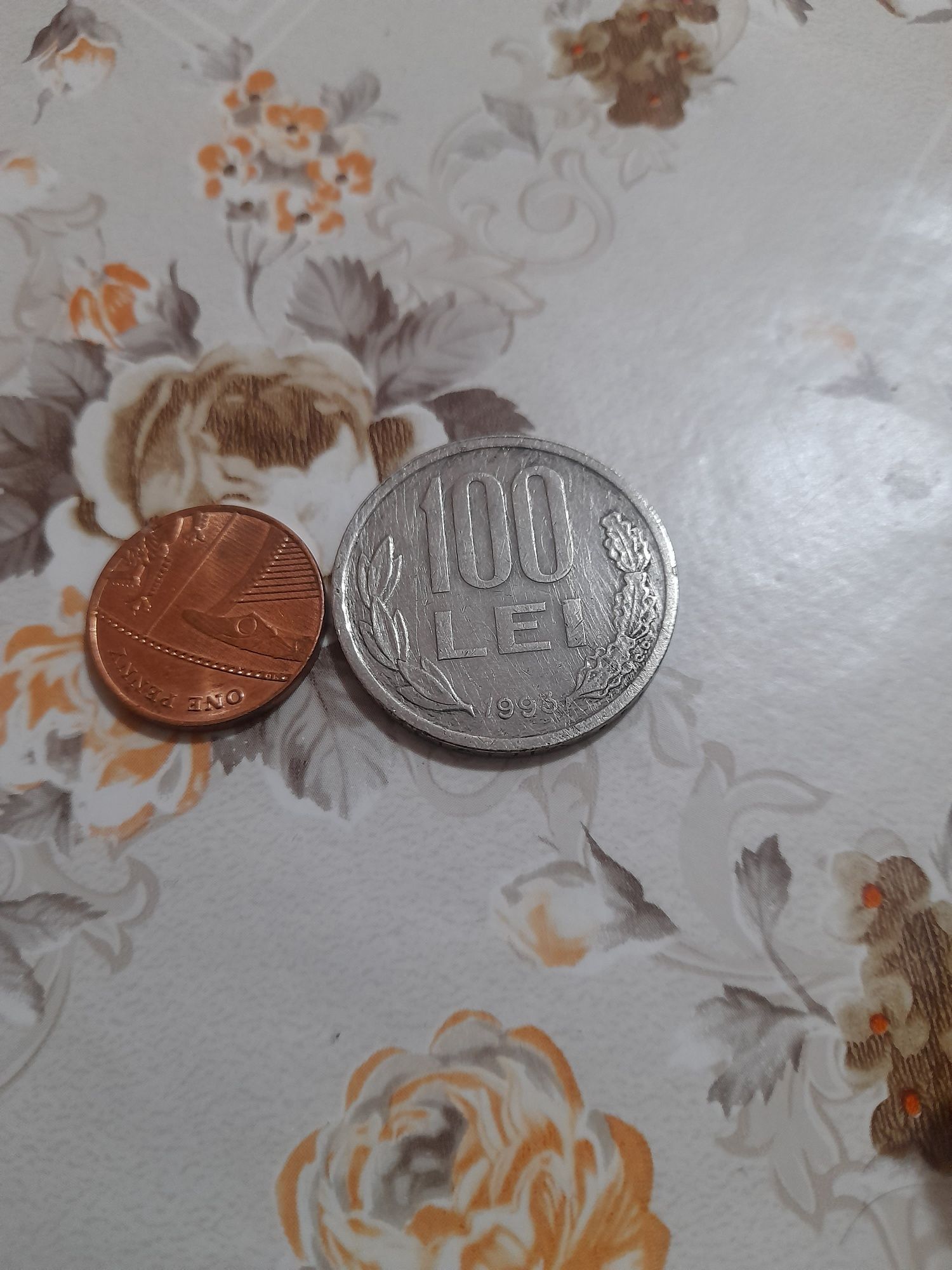 Vind 2 monede de colectie,100 lei si one penny