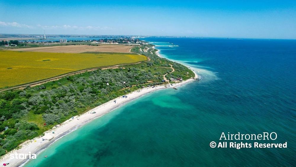 Teren intravilan lot  1000mp cu vedere frontală la mare
