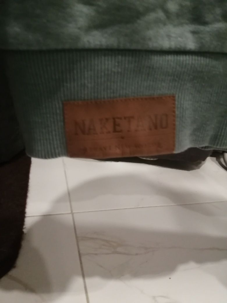 Naketano слуитчър