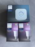Philips Hue - 2 Becuri multicolor + Bridge WiFi sigilate