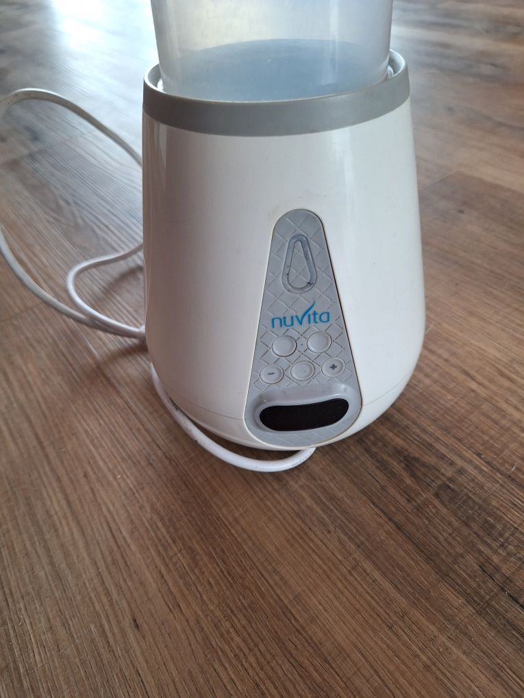 Sterilizator biberoane + încălzitor Nuvita