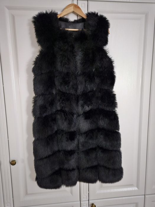 Vesta blana artificiala