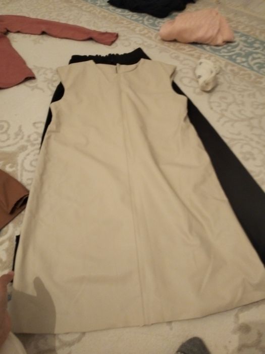 Кожаный сарафан новая.купила за 15000 с рубашкой.продаю за 2000тг.