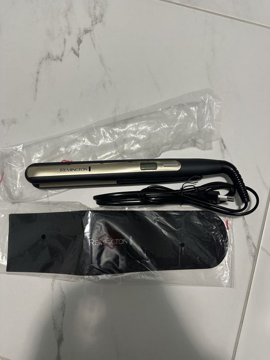 Ново! Преса за коса Remington 2в1