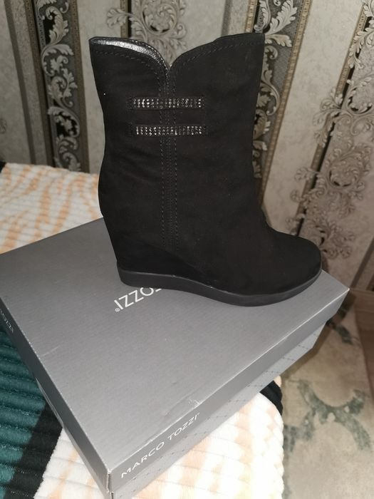 Продам новые сапоги