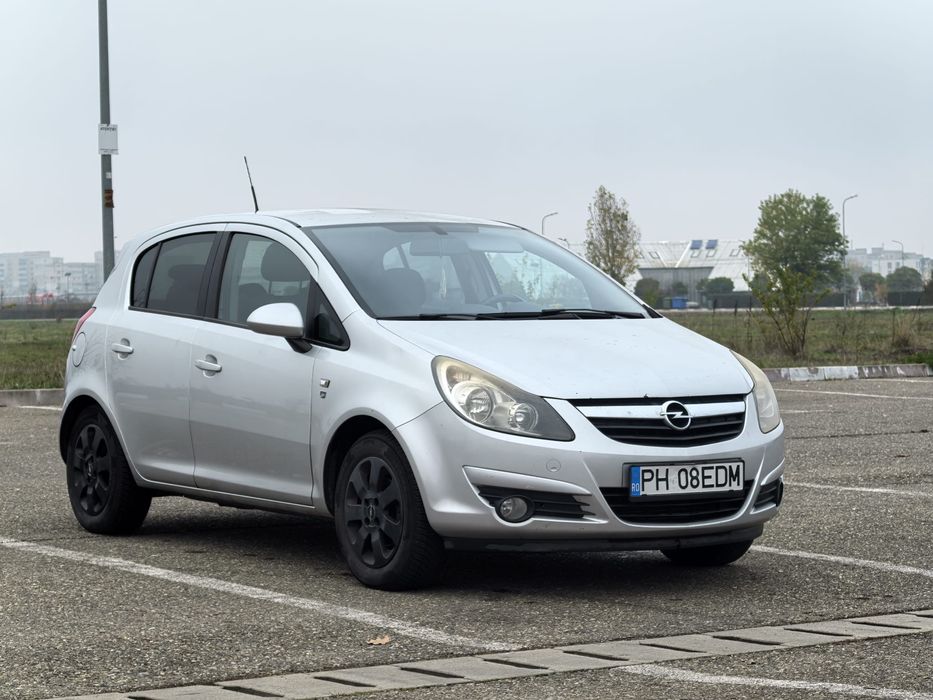 Opel corsa D 1.3 ,95 cai 2012 consum mic ,cruise,incalzire scaune