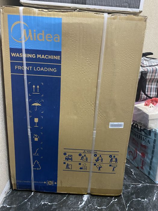 Стиральная машина midea.