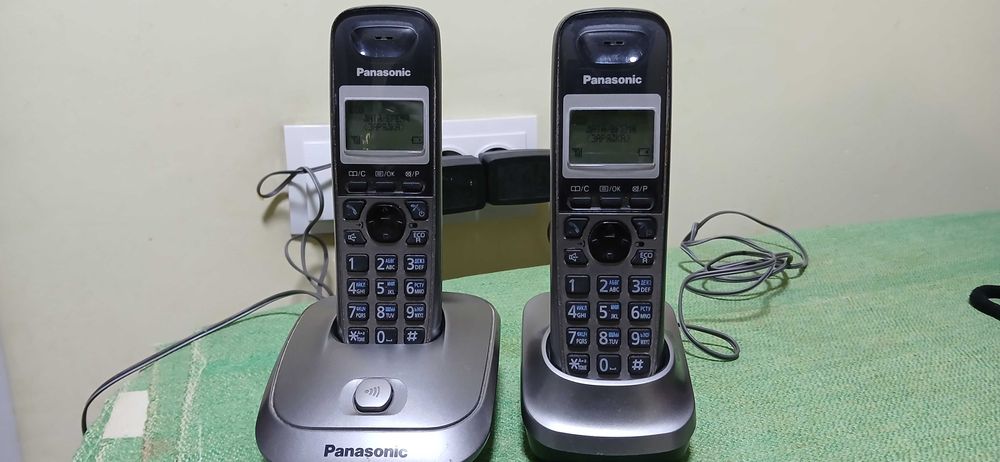 Panasonic стационарный без проводной домашний телефон.