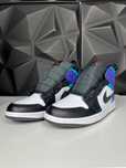 Jordan 1 Mid Teal Purple