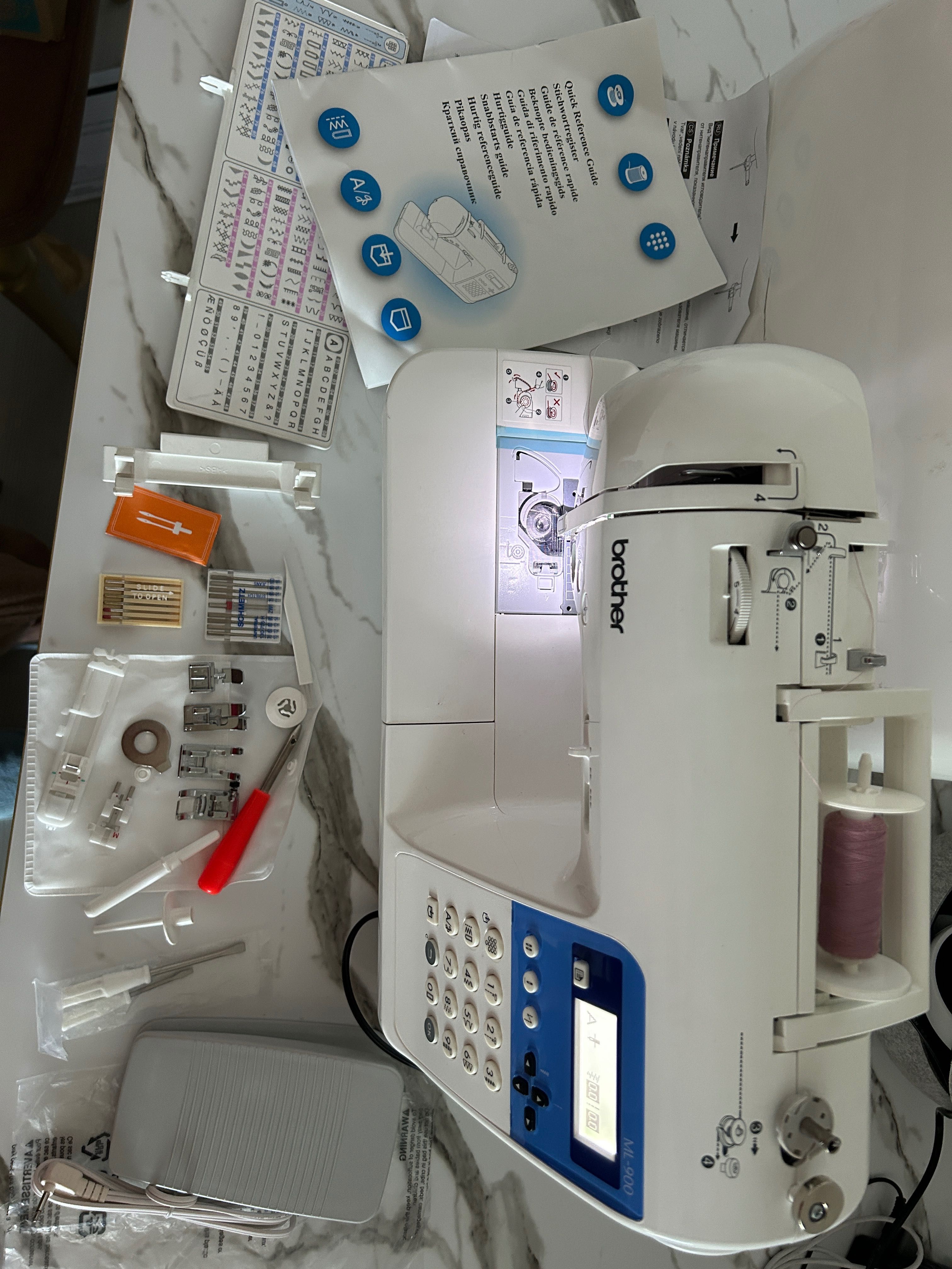 Mașina de cusut și brodat Brother ML-900