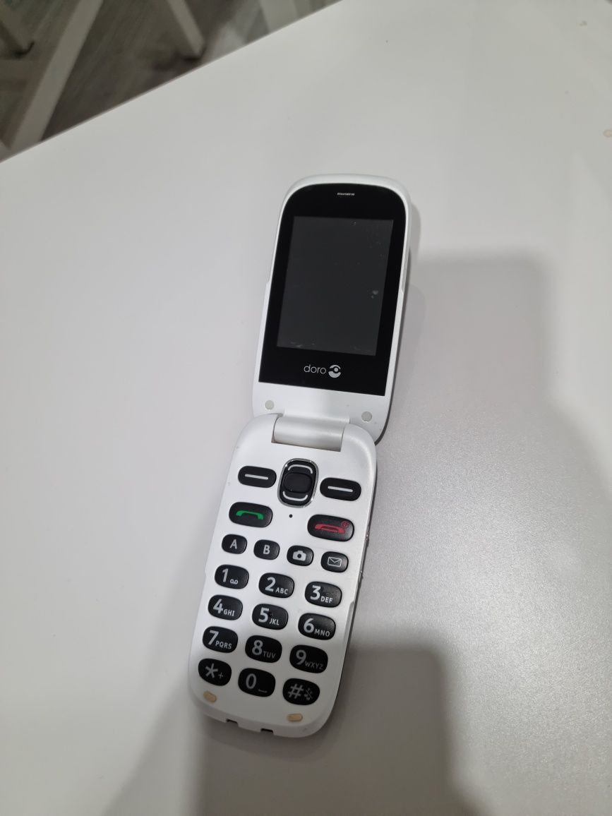 Telefon cu clapeta perfect funcțional cu Limba Romana