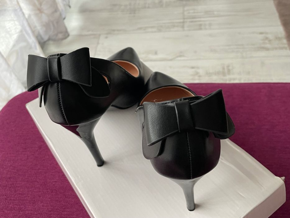 Обувки нови или обувани еднократно