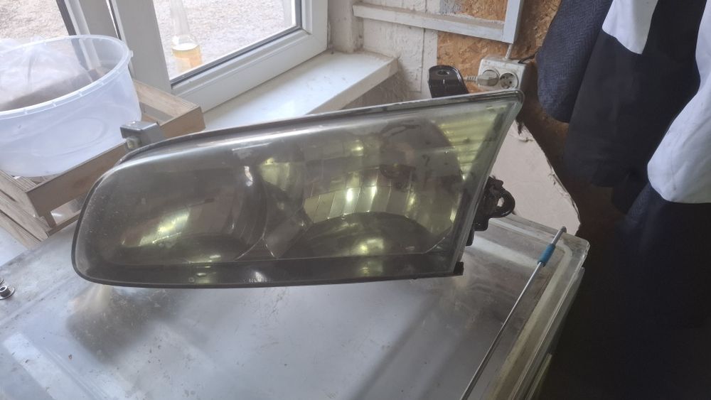 Левая фара camry 25  оригинал