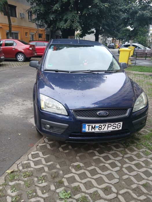 Ford focus 2 sau Dacia Logan