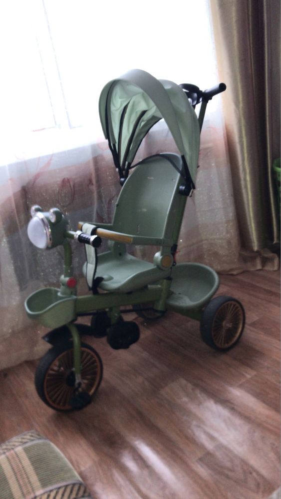 Продам велосипед с ручкой