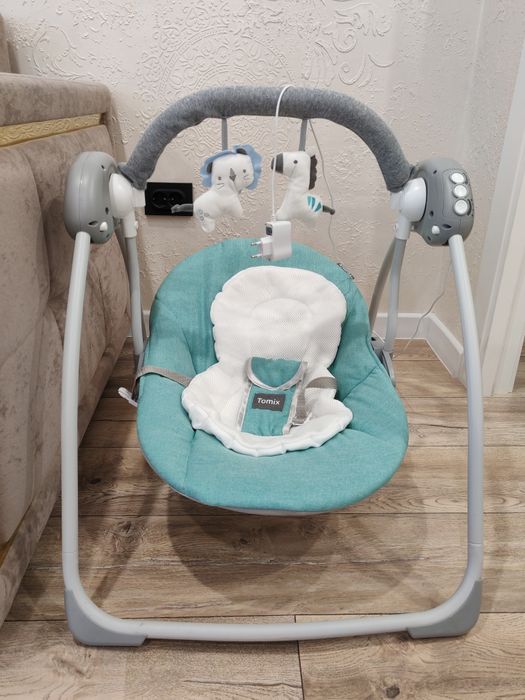 Продам качели Tomix для новорожденных детей
