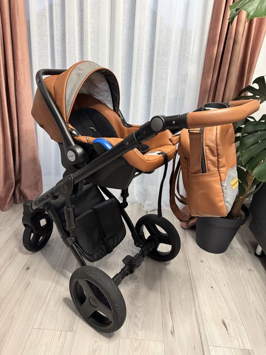 Carucior Krausman 3 in 1 + un carucior cadou si 3 cearsafuri mici