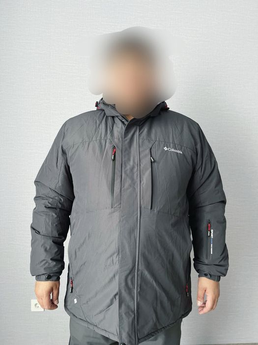 Продам мужскую зимний пуховик новый
