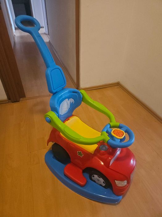 Masinuta Ride-On 4 in 1 Dolu Step Car Rosu pentru copii intre 1-3 ani