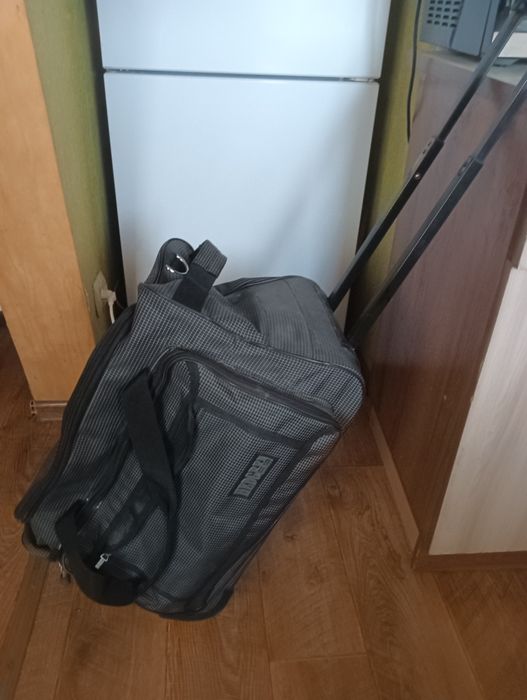 Дорожная сумка на колёсиках