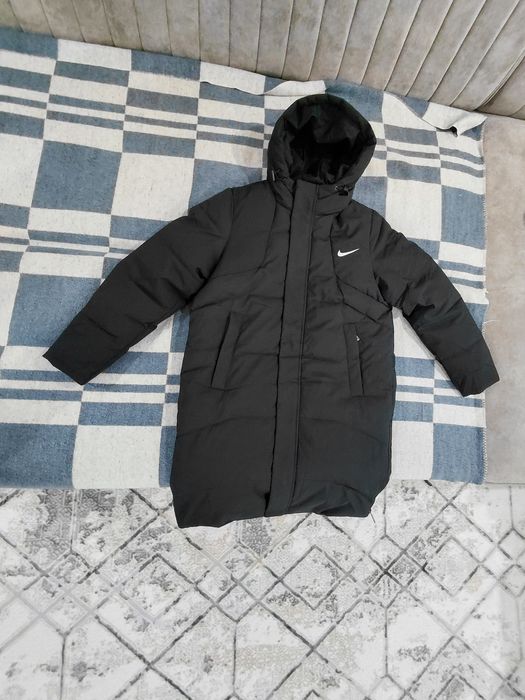 Продам новый мужской пуховик