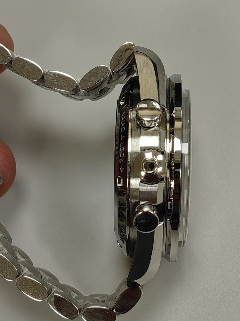 Omega Speedmaster Silver Snoopy 50th anniversary Edition chronograph