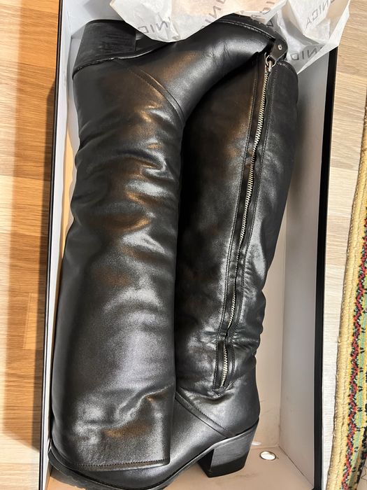 Продаю кожаные сапоги