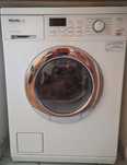 Masina de spalat 2 in 1 cu uscator de rufe integrat Miele Softronic