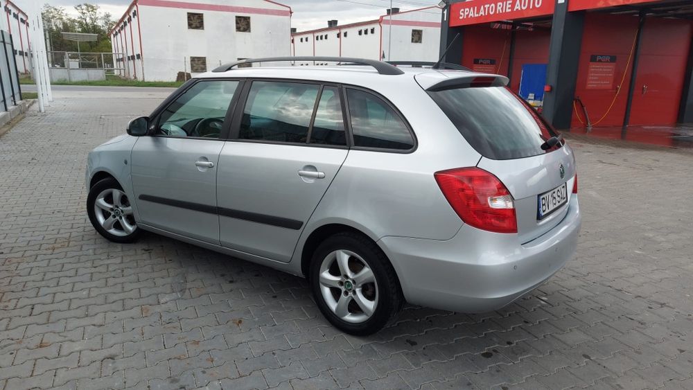 Skoda Fabia 1.6TDI-2012-EDITIE FAMILY-Senzori parcare-Climatronic etc.