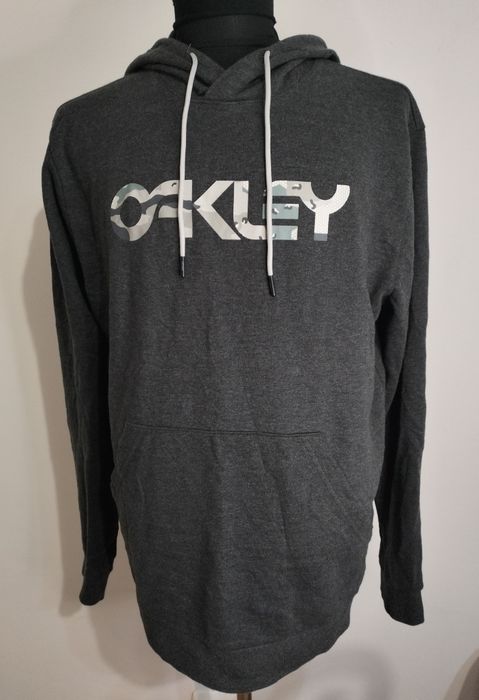 Hanorac Oakley L și jacheta Nike Tech XL