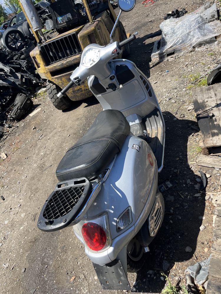 Piaggio Vespa gts / granturismo 125 кубика
