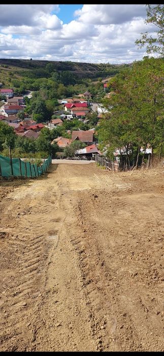 Vand teren 1300 mp.situat în comuna bucovat sau schimb cu garsonieră..