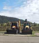 Buldoexcavator cu lame, furci descarcare paleti ,demolări, terasări ,