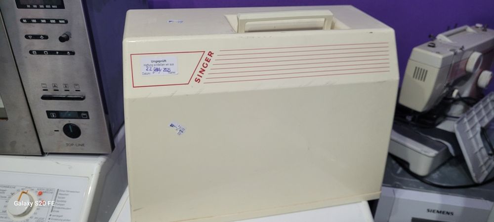 Mașina de cusut Singer