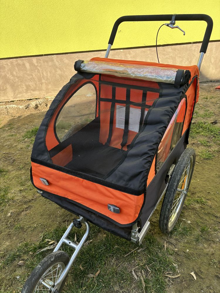 Remorca bicicleta copii