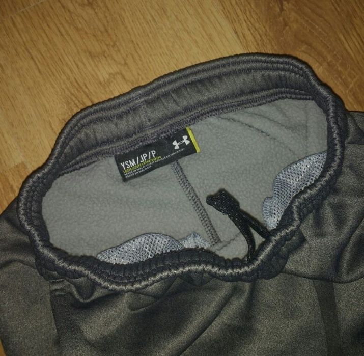 Pantaloni de trening Under Armour Storm1 mărimea 8 ani