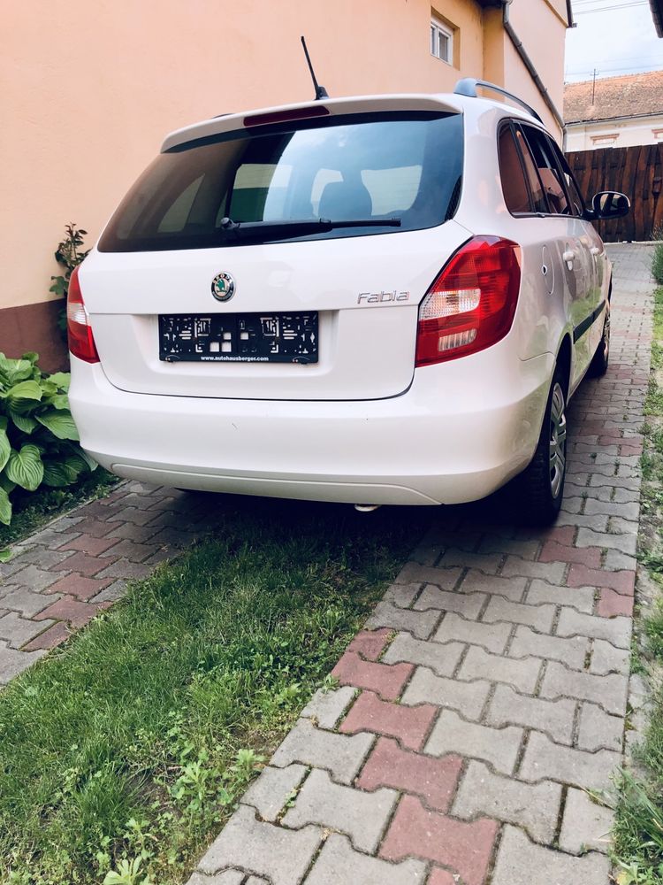 Skoda fabia 1.6 tdi,105 cp,an 2012,clima functionabil,navigatie.