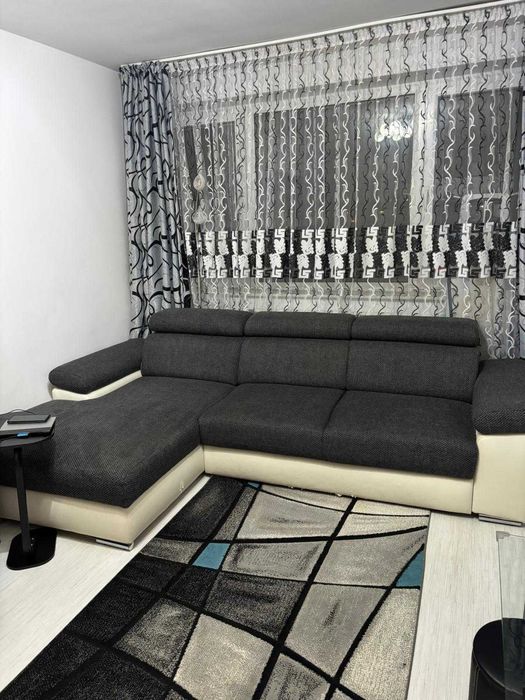 Canapea extensibila + spațiu depozitate