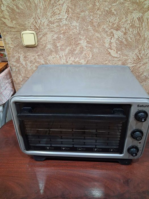 Продам рабочую электрическую печь Saturn б/у, объём 36 л