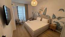 Apartament cu 2 camere, 2 bai + loc de parcare de inchiriat Axxis Nova